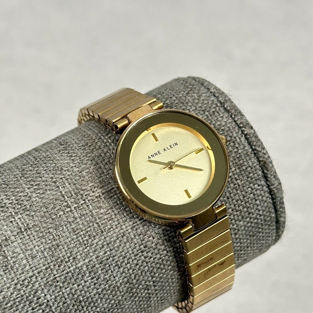 Anne Klein Watch Womens 27mm Round Modern Gold Tone Stretchy Quartz New Battery